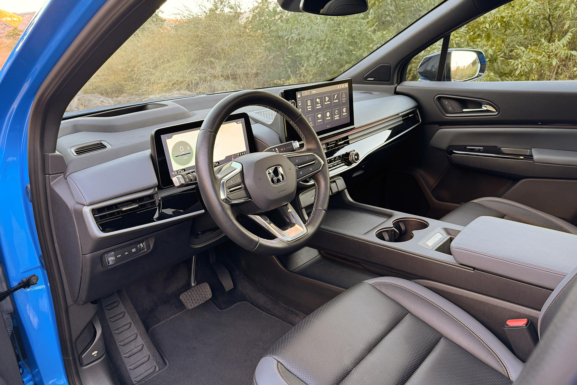 2024 Honda Prologue Elite interior in Black showing the dashboard and center console.