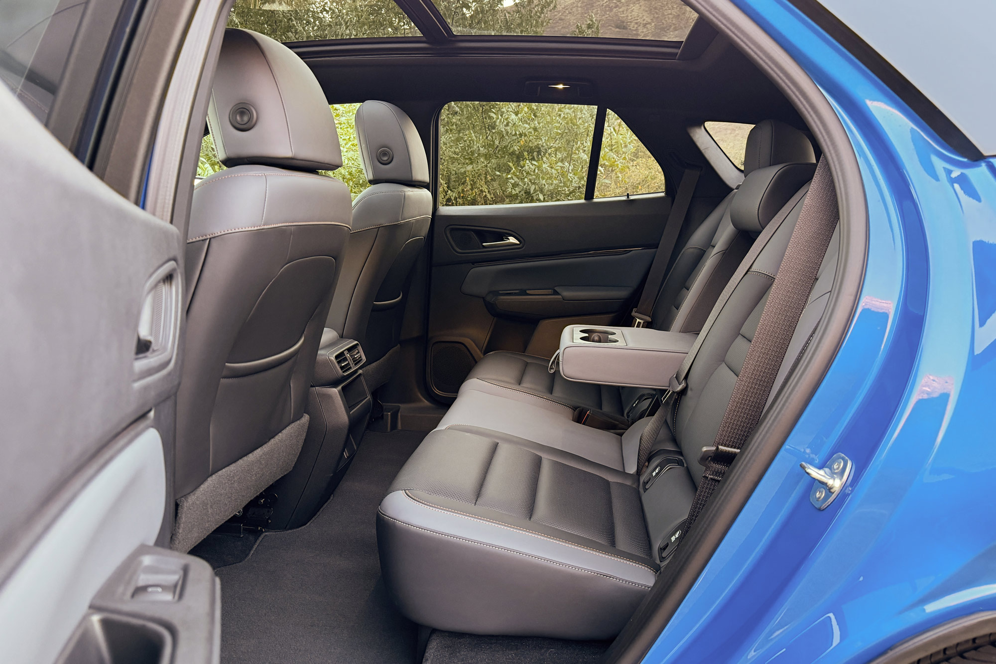 2024 Honda Prologue Elite interior in Black showing the back seat and panoramic sunroof.