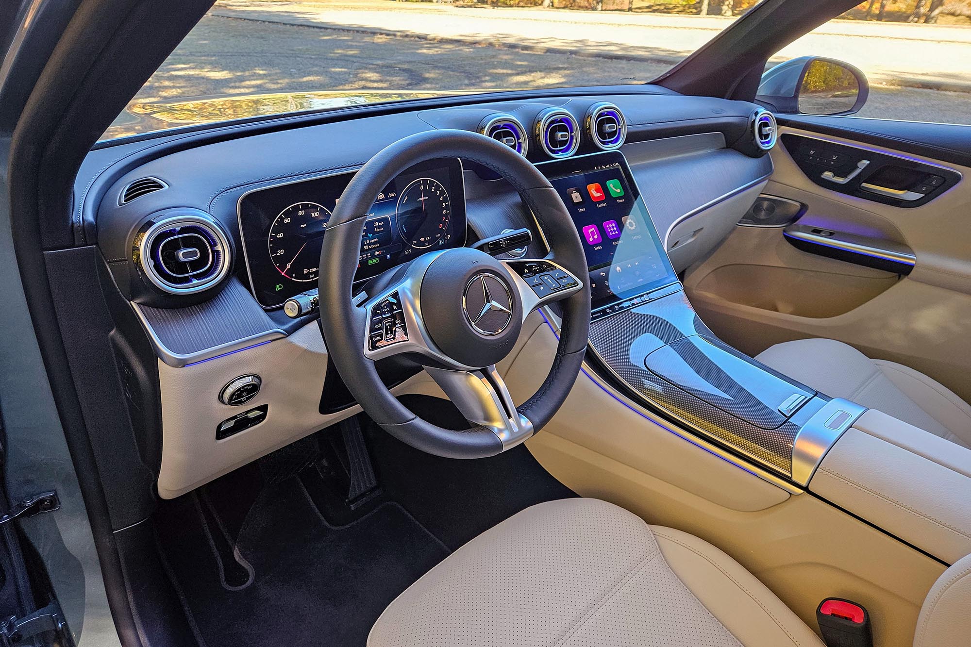 2025 Mercedes-Benz GLC 350e plug-in hybrid interior showing the dashboard and front seats.