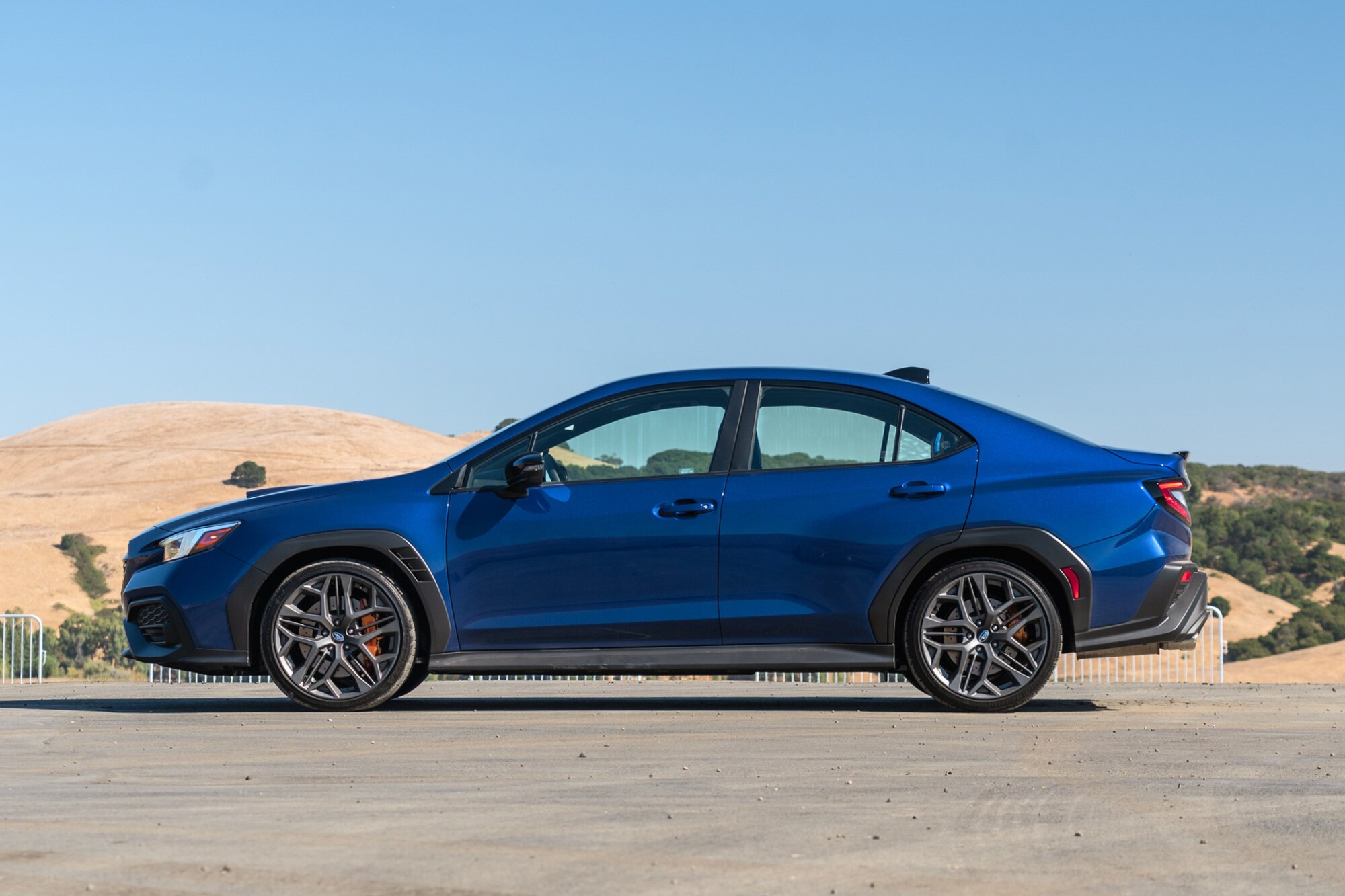 Side of a 2025 Subaru WRX tS in Sapphire Blue