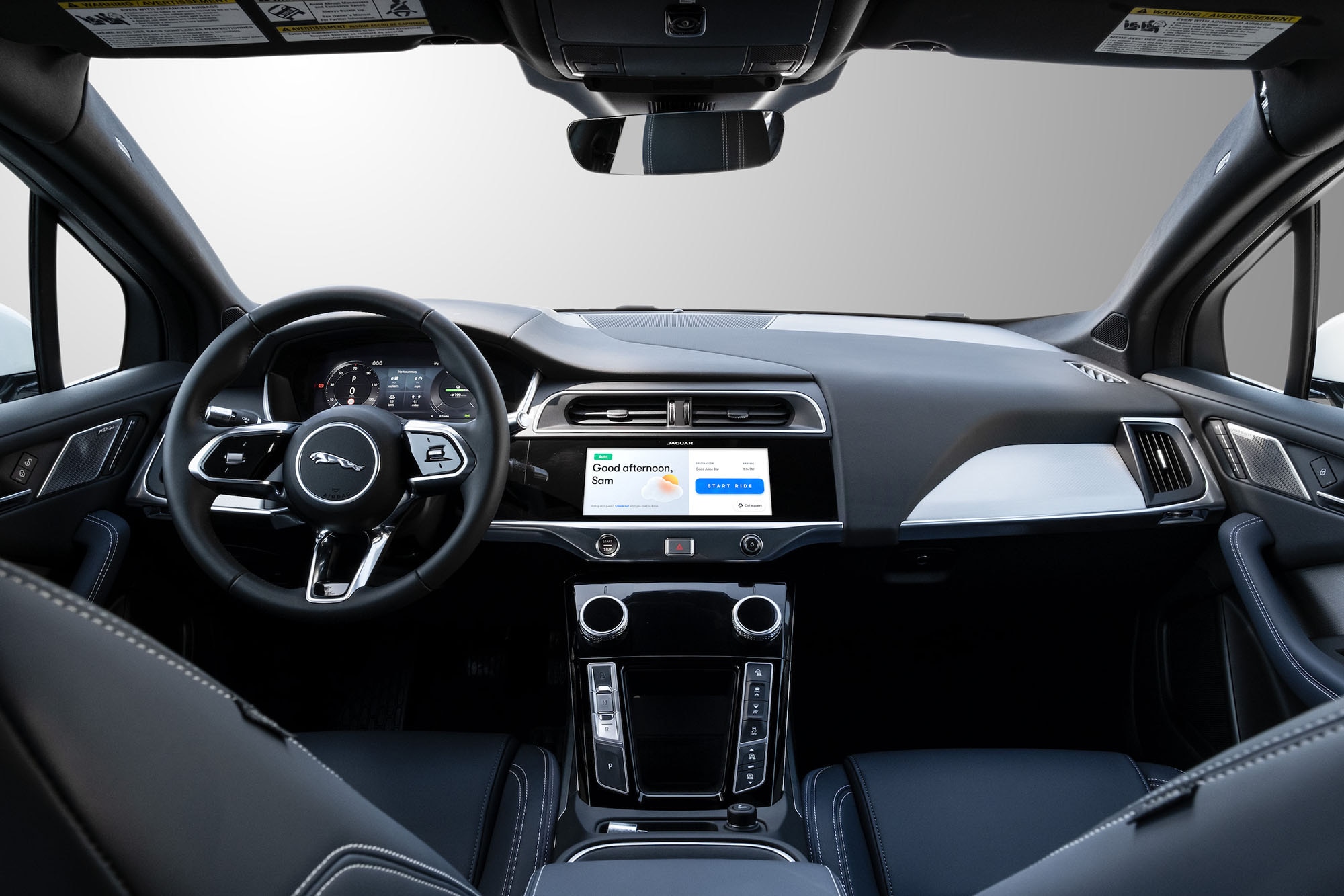 The front seats and dashboard of Waymo's Jaguar I-Pace