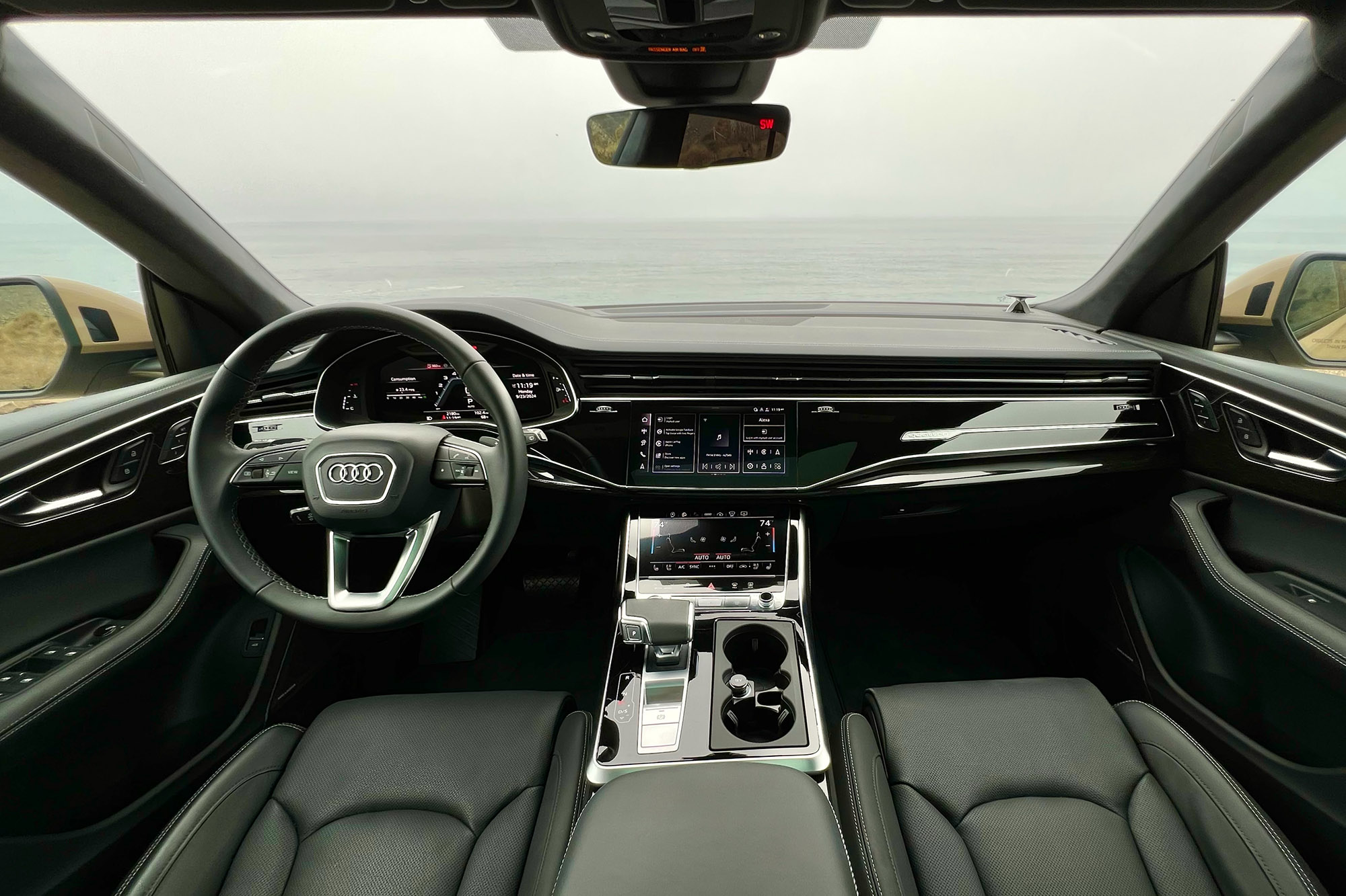 2025 Audi Q8 Prestige interior showing the dashboard and front seats.