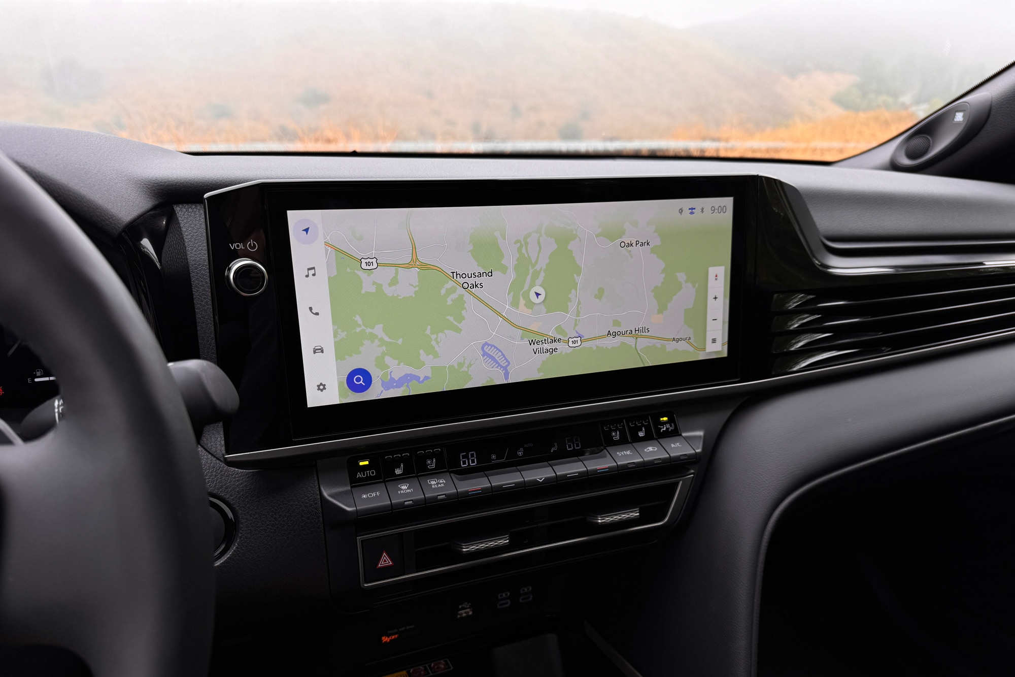 2025 Toyota Camry XSE interior showing the Toyota Audio Multimedia infotainment system.