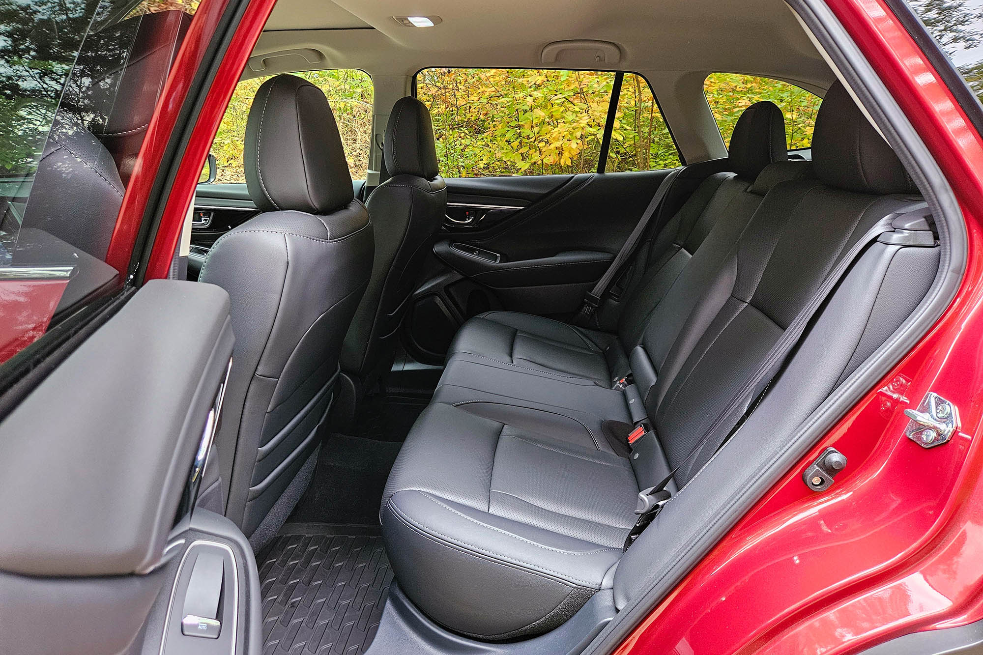 2025 Subaru Outback Touring XT with black interior, back seats