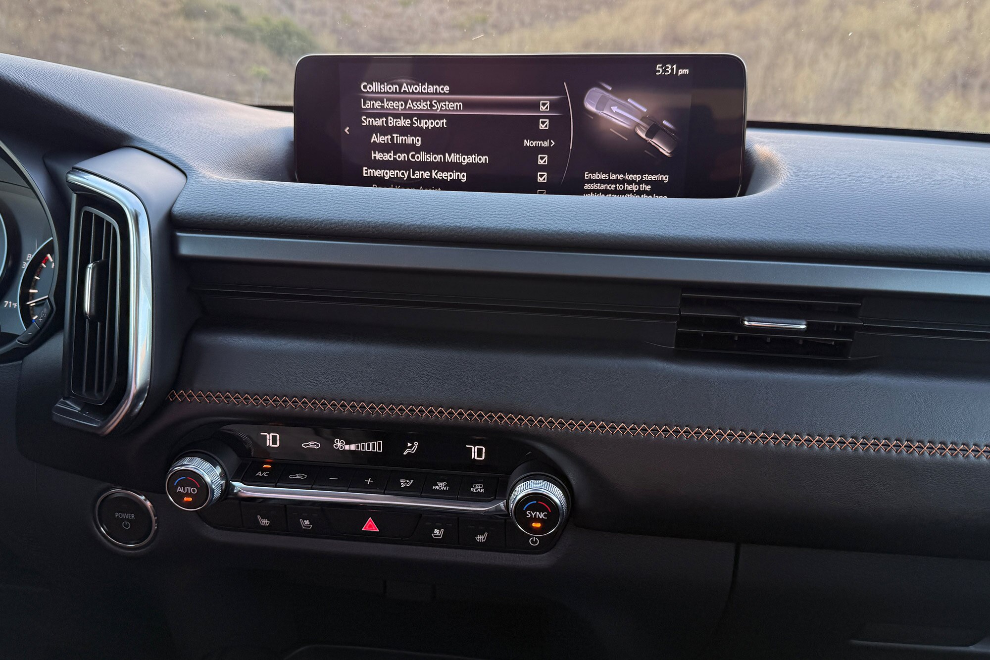 The safety features menu in a 2025 Mazda CX-50 Hybrid Premium Plus