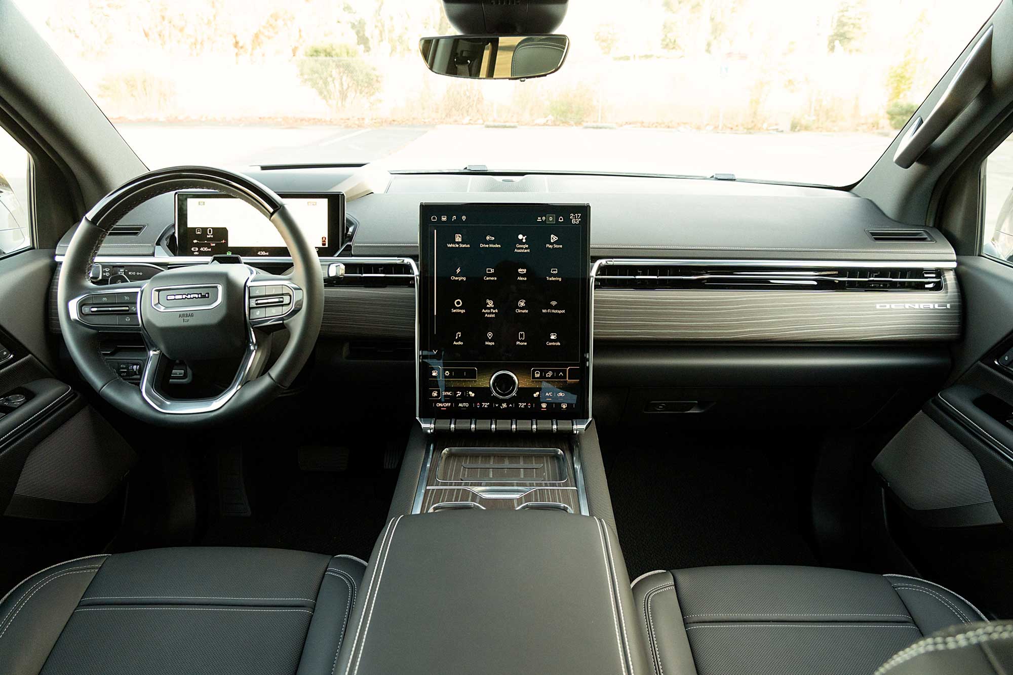 2025 GMC Sierra EV Denali interior showing the dashboard, front seats, and center console.