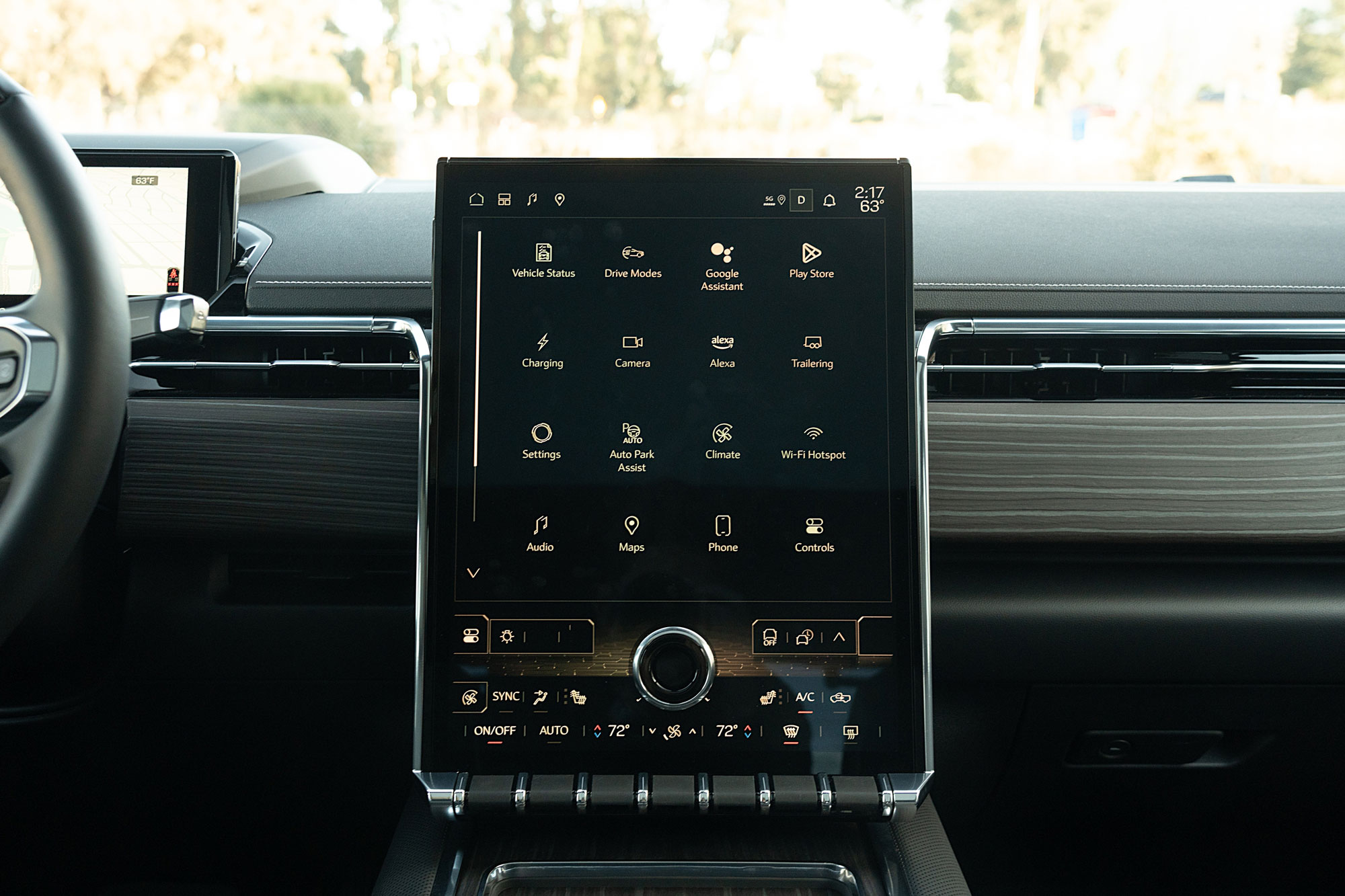 2025 GMC Sierra EV Denali interior showing the infotainment system.