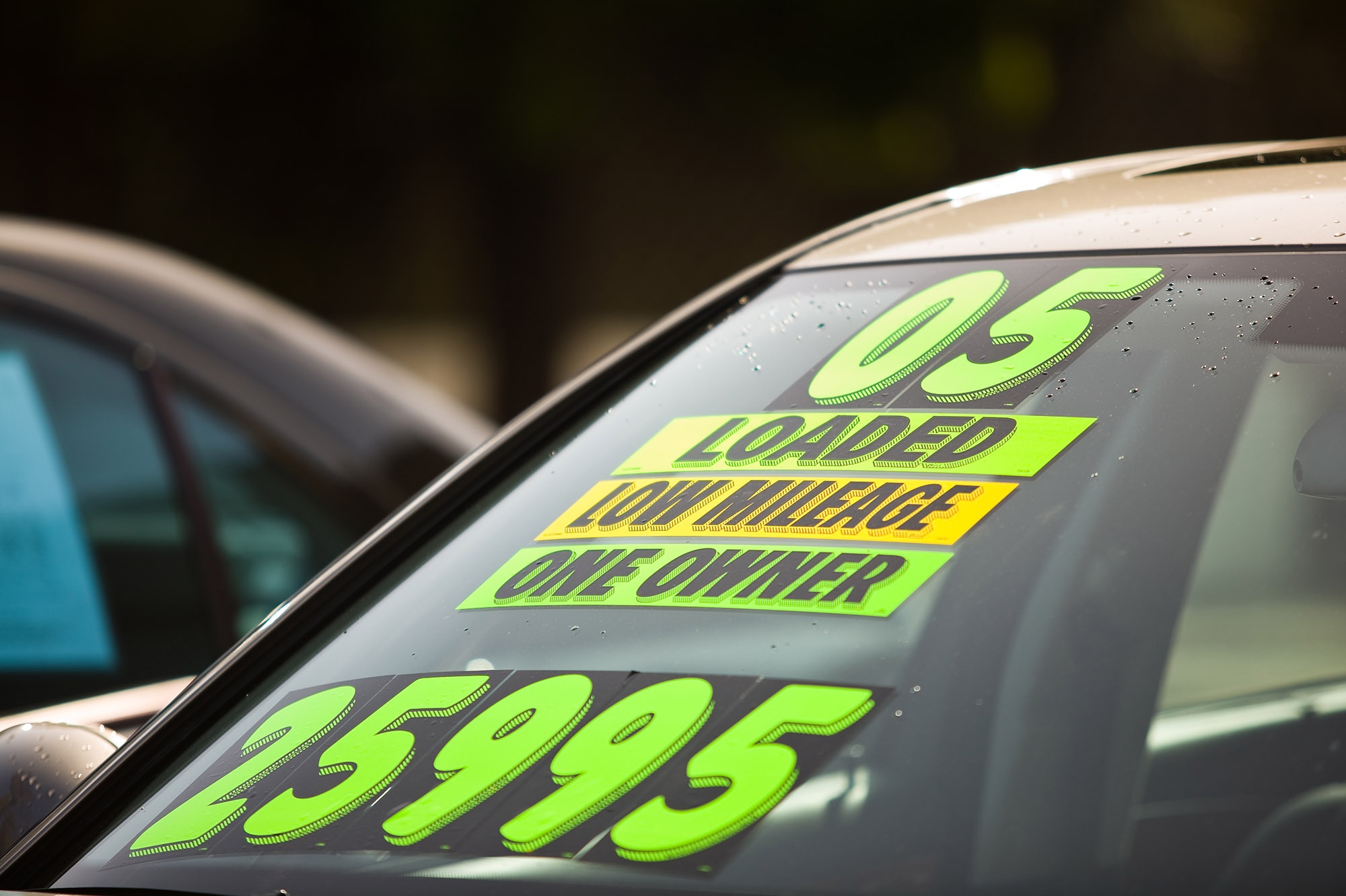 Windshield stickers on a used car for sale