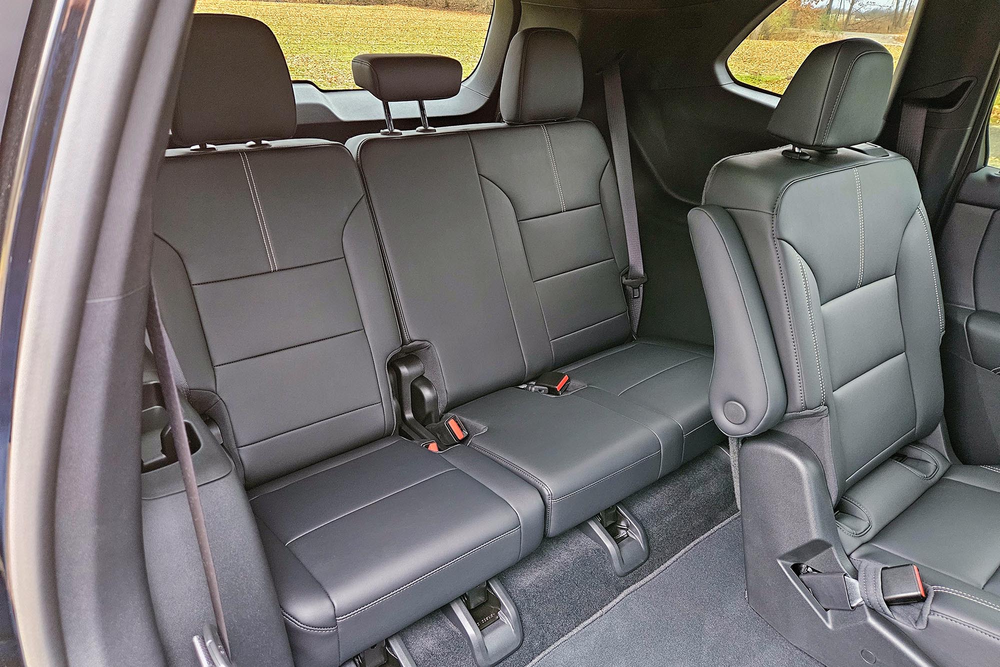 2024 GMC Acadia interior showing the third-row seat.