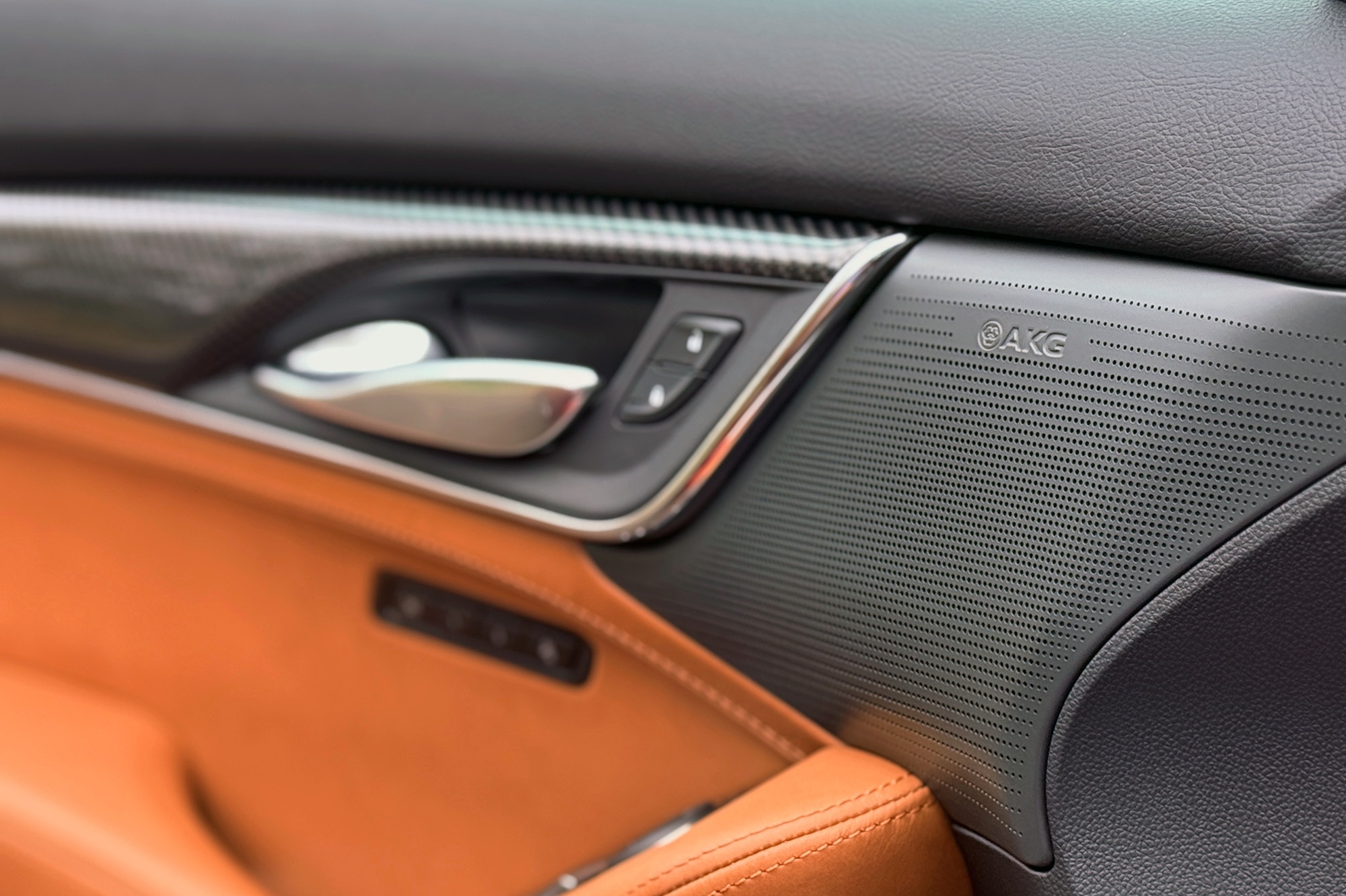 2025 Cadillac CT5 Premium Luxury door card with contrasting Sedona Sauvage, AKG speaker grille detail