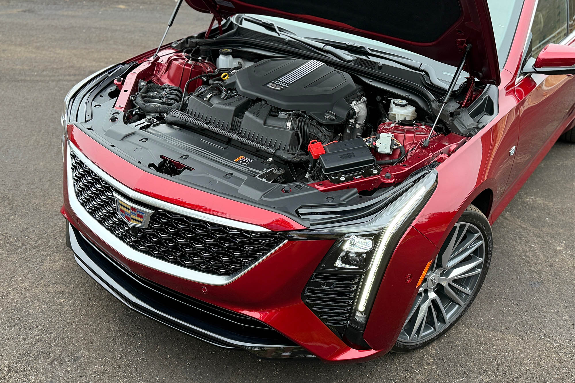 2025 Cadillac CT5 Premium Luxury in Radiant Red showing the twin-turbocharged V6 engine