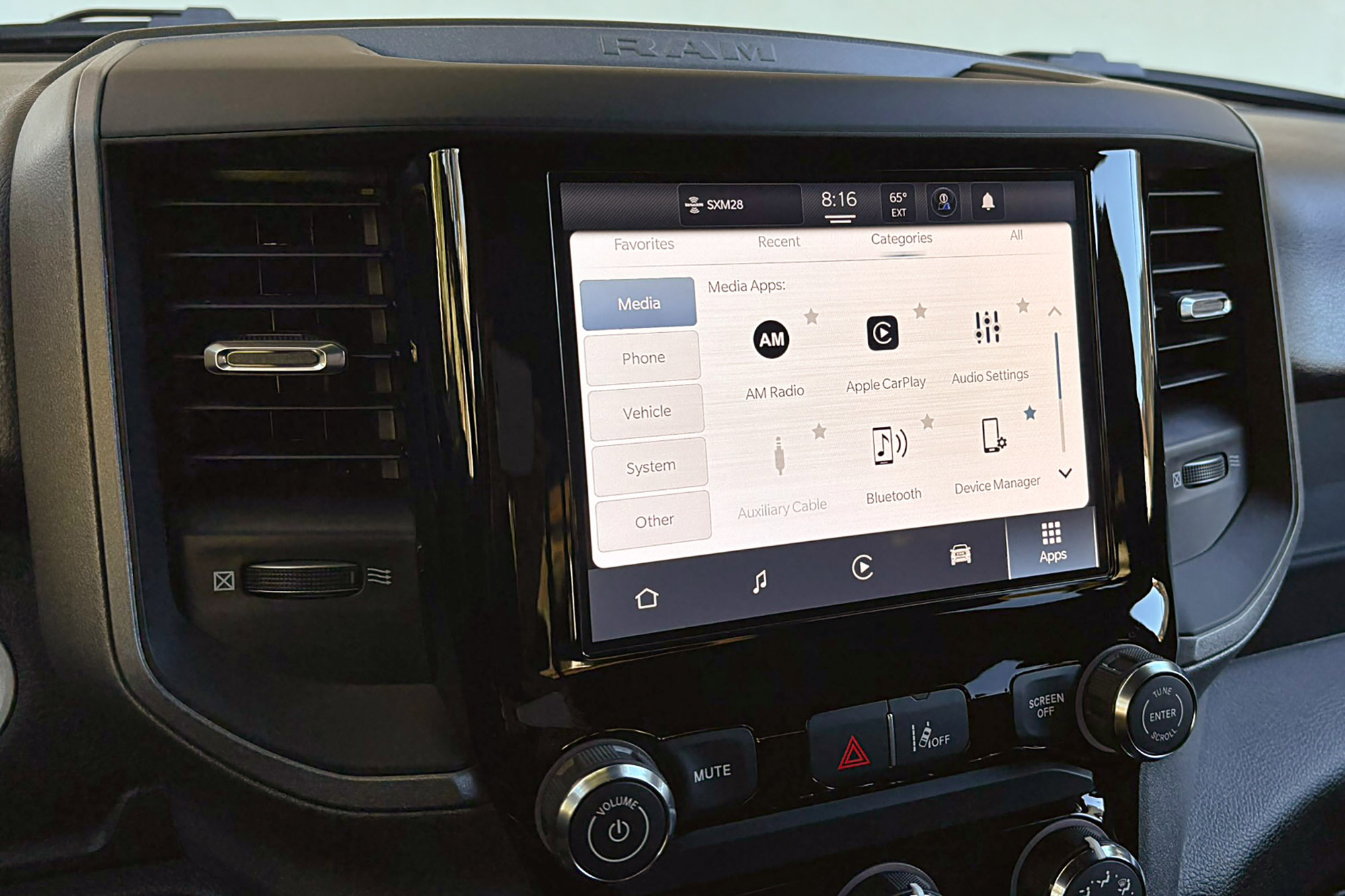 2025 Ram 1500 Warlock interior showing the 8.4-inch touchscreen infotainment system.