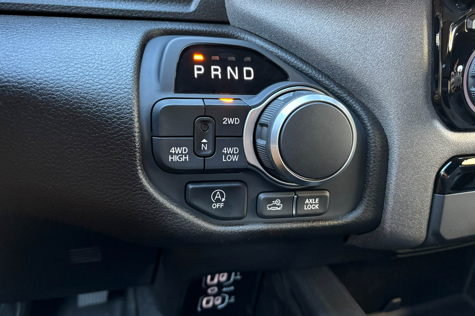 2025 Ram 1500 Warlock interior showing the part-time 4WD transfer case controls.