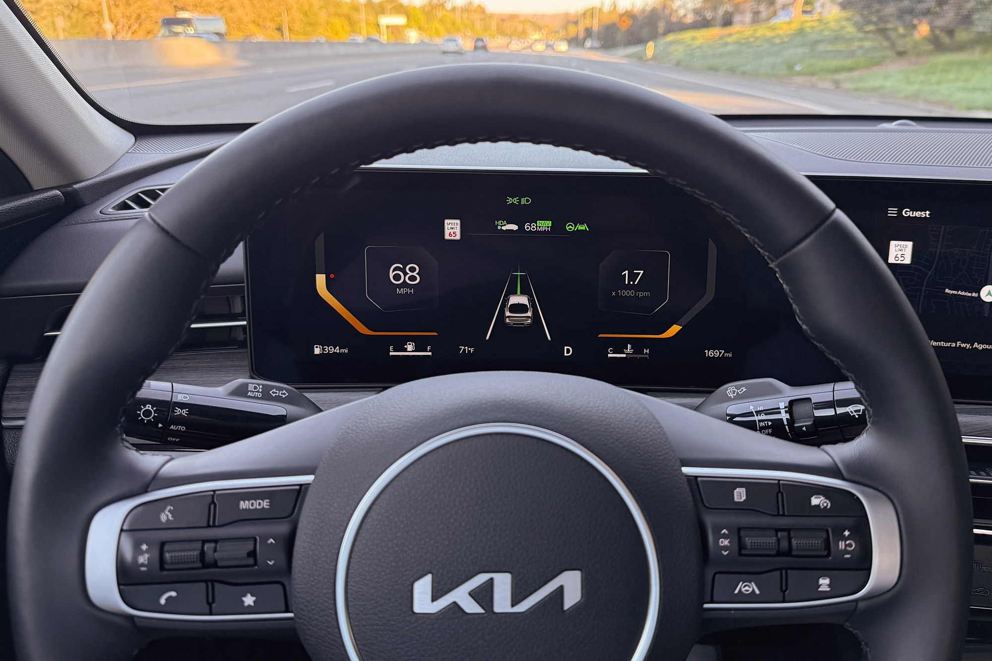 2025 Kia K5 EX interior showing the digital instrumentation and Highway Driving Assist.