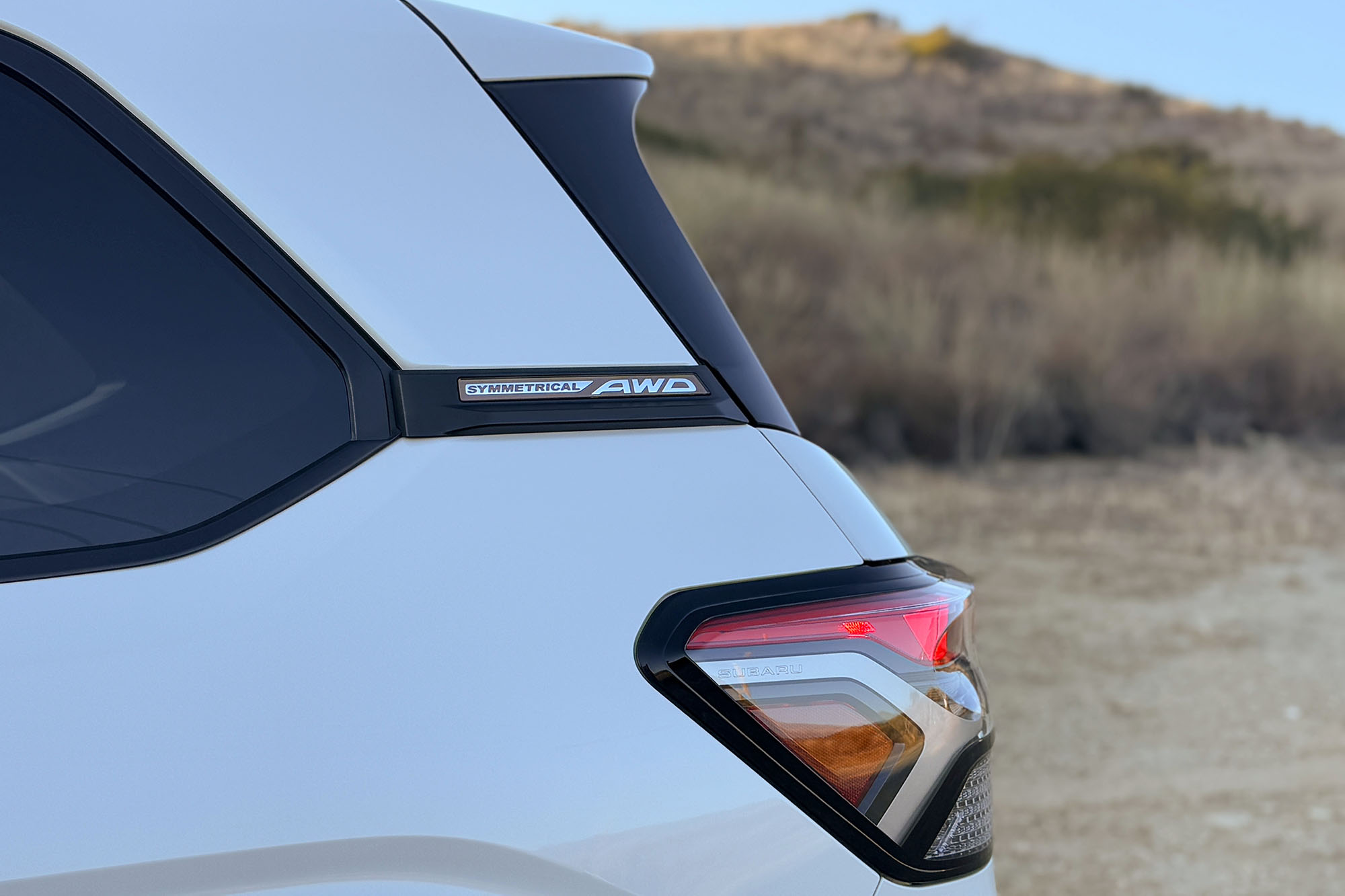 2025 Subaru Forester Sport Symmetrical AWD emblem on the rear roof pillar.