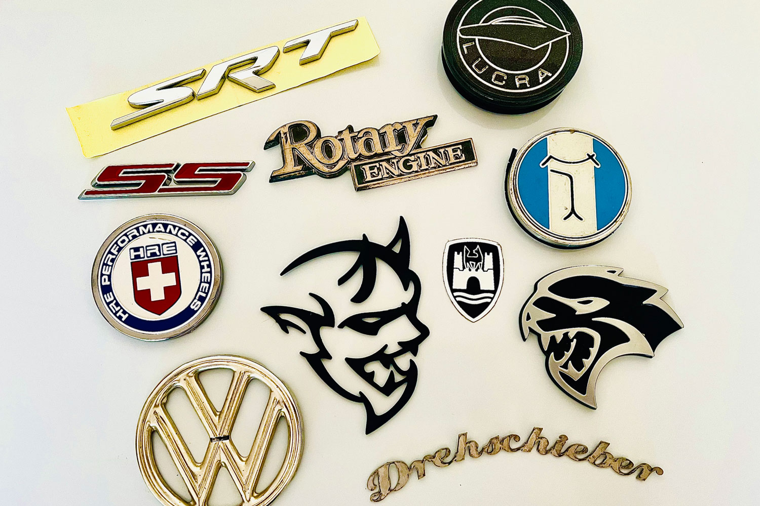 A variety of adhesive car badges